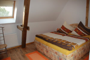 Ferienwohnung "Dahlienzauber", Schlafzimmer - Tourismushof Clewes Grün