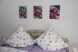 Ferienwohnung "Fliedertraum", Schlafzimmer Detail - Tourismushof Clewes Grün