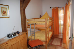 Ferienwohnung "Gartenzauber", Schlafzimmer - Tourismushof Clewes Grün