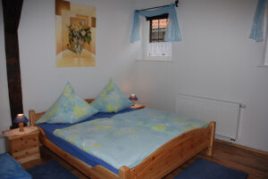 Ferienwohnung "Gartenzauber", Schlafzimmer - Tourismushof Clewes Grün