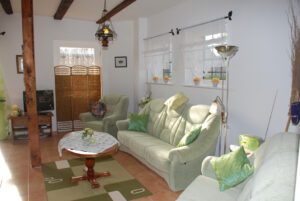 Ferienwohnung "Immergrün", Wohnbereich - Tourismushof Clewes Grün