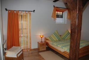 Ferienwohnung "Immergrün", Schlafzimmer - Tourismushof Clewes Grün
