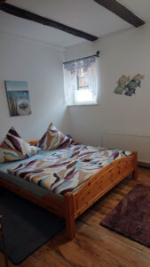 Ferienwohnung "Gartenzauber" - Schlafzimmer