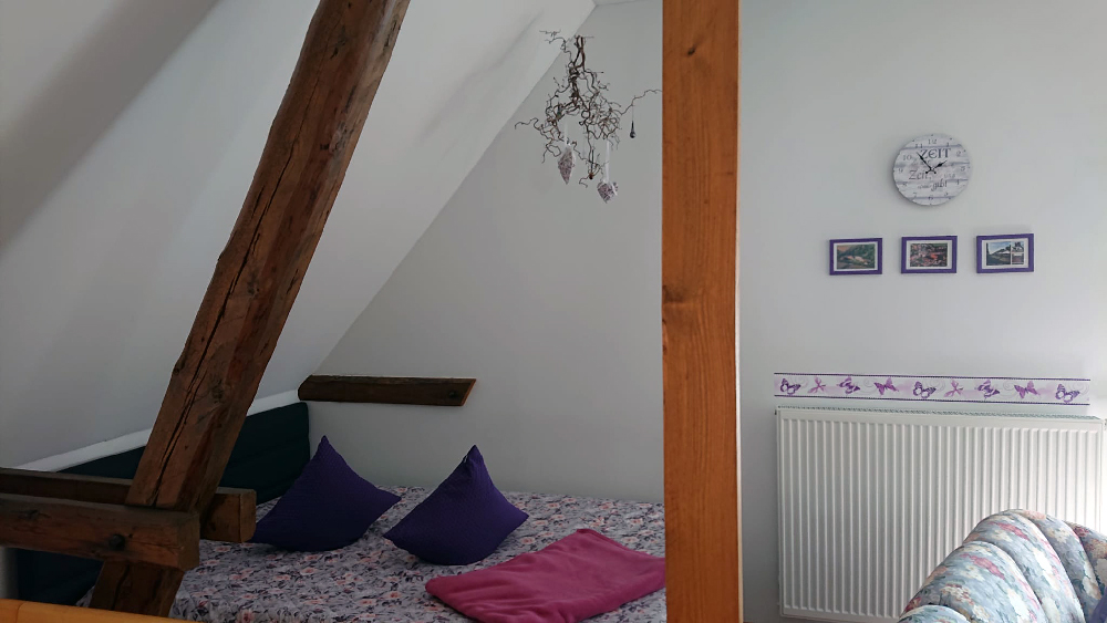 Ferienwohnung "Fliedertraum" - Schlafbereich